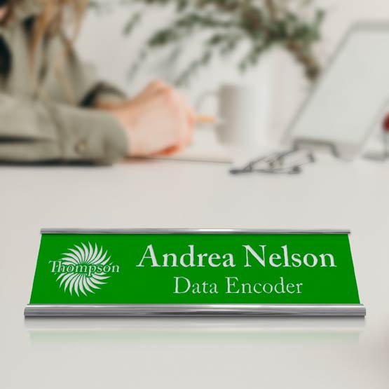 Custom Engraved Plastic Desk Name Plate On Desk Near Woman.