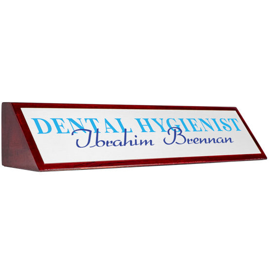 Rosewood Desk Wedge With White Aluminum Plate Printed With Dental Hygienist Ibrahim Brennan In Teal And Blue