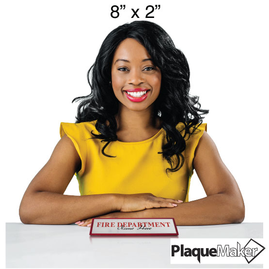 Woman with a custom 'Fire Department' name plate with PlaqueMaker branding