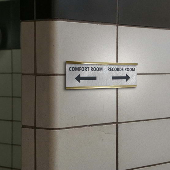 Titanium Office Plate Laser Fused With Custom Room Directions And Arrows Artwork Mounted Onto Wall Via Gold Bracket 