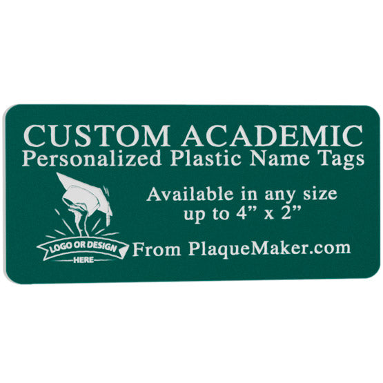 An evergreen plastic name tag with rounded corners and customized white engraved text. Placeholder artwork is in engraved in the corner, set on a white background.