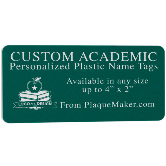 An evergreen plastic name tag with rounded corners and customized white engraved text. Placeholder artwork is in engraved in the corner, set on a white background.