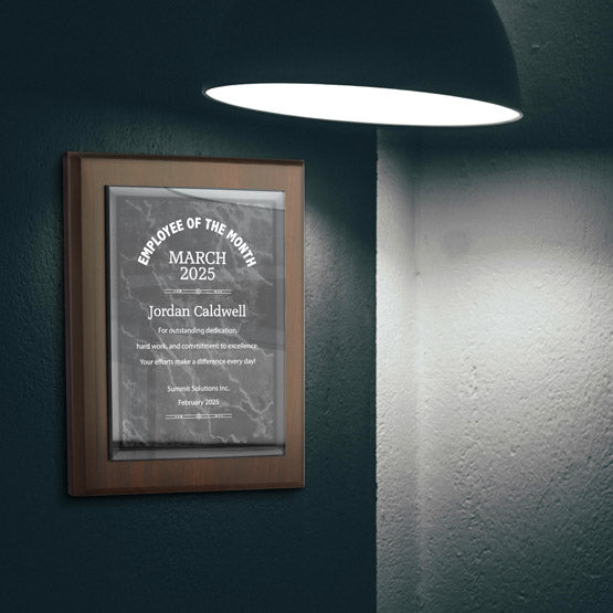 Black Marble Themed Acrylic Plaque Award For Employee Of The Month With Wood Board Mounted On Office Wall By Lamp