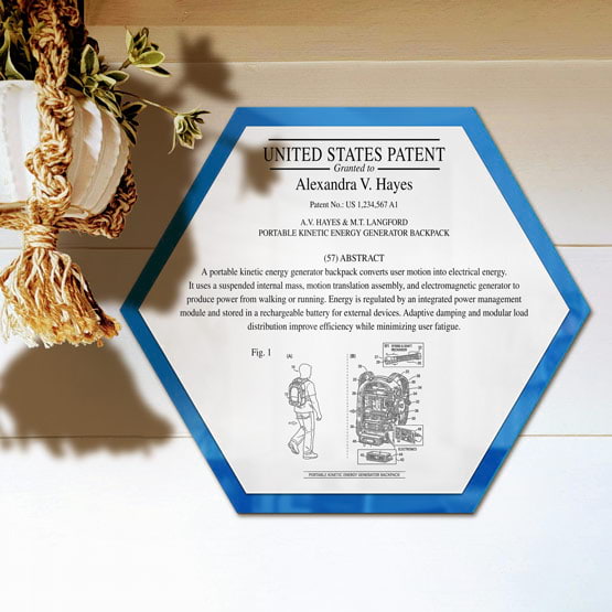 Honeycomb Patent Plaque With Blue Acrylic Board And White Plate Printed With Sample Details Mounted Onto Wall Near Plant