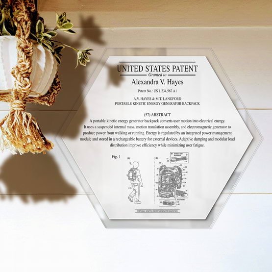 Honeycomb Patent Plaque With Clear Acrylic Board And White Plate Printed With Sample Details Mounted Onto Wall Near Plant