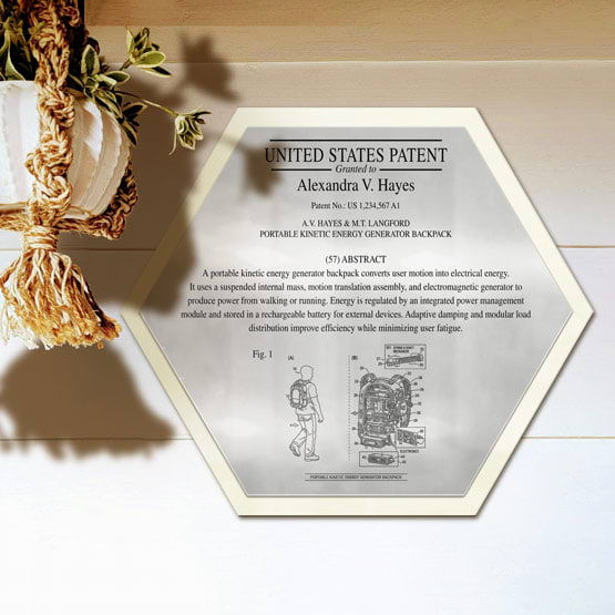 Honeycomb Patent Plaque With Ivory Acrylic Board And Silver Plate Printed With Sample Details Mounted Onto Wall Near Plant