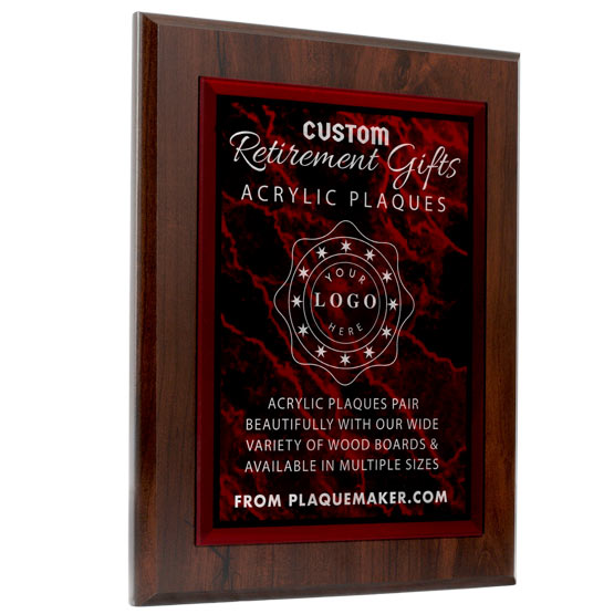 A custom red acrylic plaque with white engraved text and placeholder artwork, set at a slight angle on a plain white background.