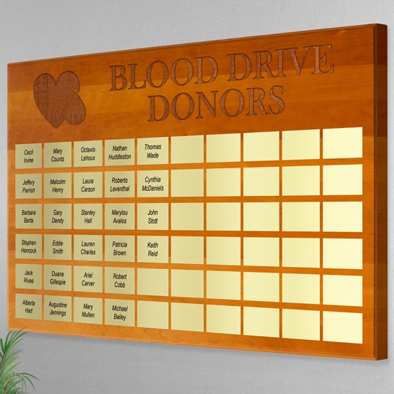Custom Lobby Plaque Award For Blood Donors With Heart Artwork And Dozens Of Silver Aluminum Plates On A Wood Board 
