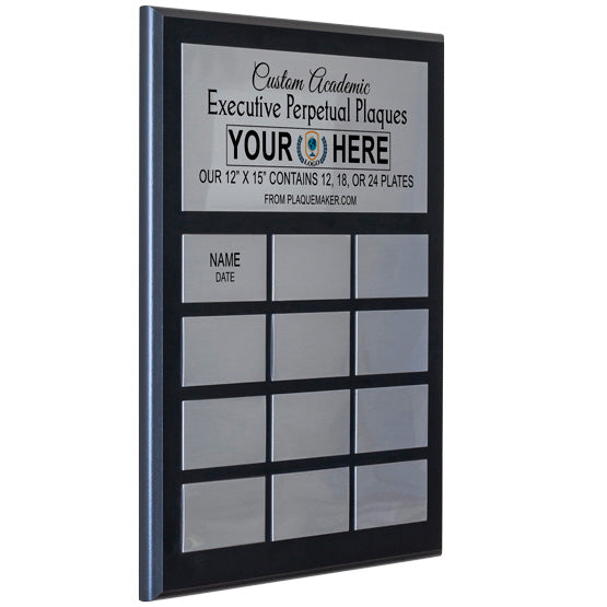 A perpetual plaque with a large top silver aluminum plate with a series of smaller silver aluminum plates beneath it on a black wooden board. Displayed at an angle with printed text on the larger plate and placeholder artwork, set on a white background.