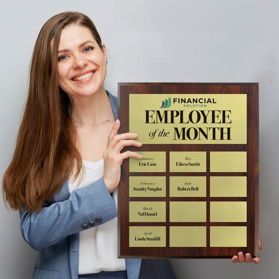 Happy Woman Holding Custom Executive Perpetual Plaque Award For Employee Of The Month With Silver Plates On A Wood Board