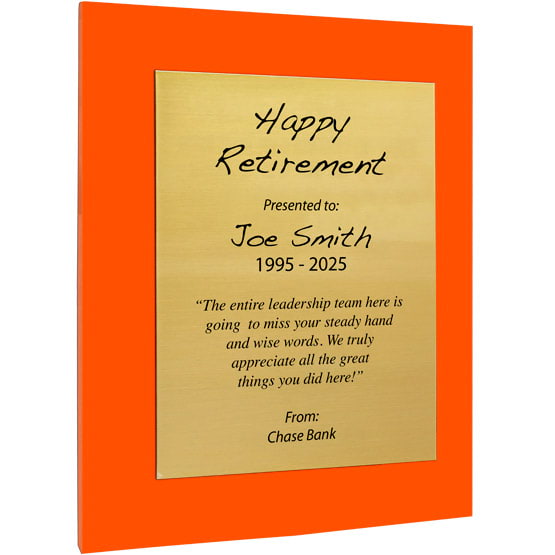 Custom Gold Aluminum Plaque With Orange Acrylic Board And Printed With Happy Retirement Message Against White Background