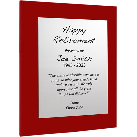 Custom Silver Aluminum Plaque With Red Acrylic Board And Printed With Happy Retirement Message Against White Background
