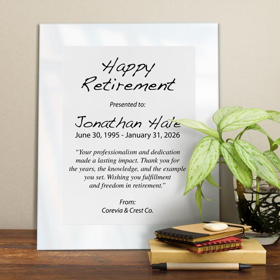 White Aluminum Plaque With White Acrylic Board And Printed With Happy Retirement Message On Shelf With Plant And Notebooks