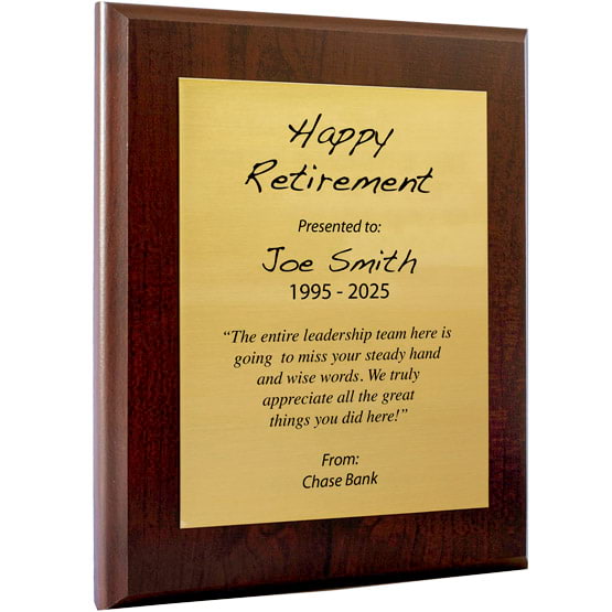 Custom Gold Aluminum Plaque With Cherry Board And Printed With Happy Retirement Message Against A White Background