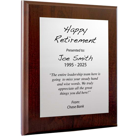 Custom Silver Aluminum Plaque With Cherry Board And Printed With Happy Retirement Message Against A White Background