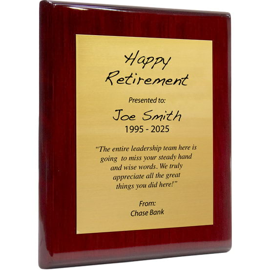 Custom Gold Aluminum Plaque With Rosewood Board And Printed With Happy Retirement Message Against A White Background