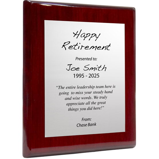 Custom Silver Aluminum Plaque With Rosewood Board And Printed With Happy Retirement Message Against A White Background