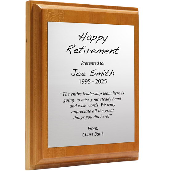 Custom Silver Aluminum Plaque With Solid Cherry Board And Printed With Happy Retirement Message Against A White Background