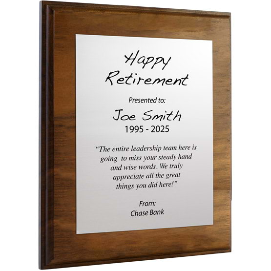 Custom Silver Aluminum Plaque With Solid Walnut Board And Printed With Happy Retirement Message Against A White Background