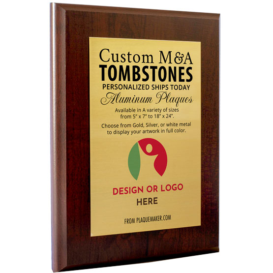 A custom plaque with a cherry wood board and gold metal plate mounted in the middle with personalized text printed on the front and placeholder art, set at an angle on a white background.