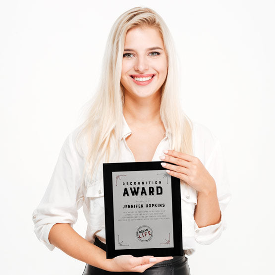 Smiling Woman In Office Holding Custom Aluminum Plaque With Wood Board And Employee Of The Month Message