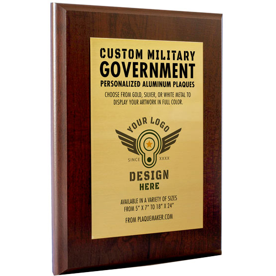 A custom gold metal plaque with a cherry wood board and personalized printed text and placeholder artwork, set at a slight angle and displayed on a white background.