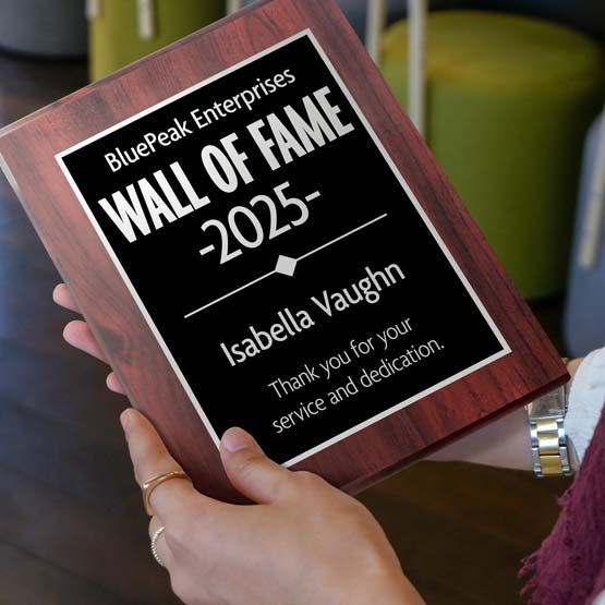 Custom Engraved Wall Of Fame Laser Engraved Aluminum Plaque For Isabella Vaughn Held By Woman.