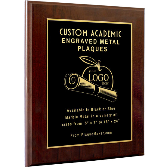 A custom black metal plaque with cherry wood board and gold engraved text, featuring a apple and diploma artwork in the middle, set on a white background.