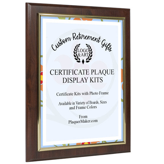 A certificate plaque kit with a gold frame attached to a wooden board and slide in certificate displayed in the frame, set at a slight angle on a white background.