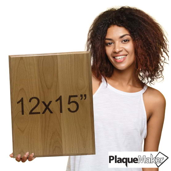 Size Guide With Happy Woman Holding A Solid Red Alder Wood Plaque And Showing 12 By 15 Inch Measurement