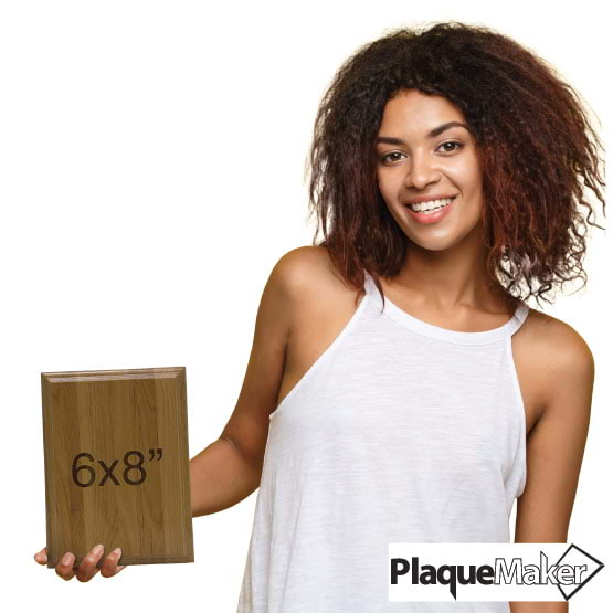Size Guide With Happy Woman Holding Solid Red Alder Wood Plaque And Showing 6 By 8 Inch Measurement Against White Background
