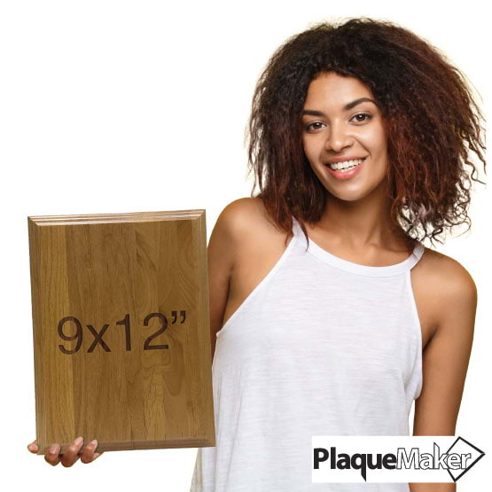 Size Guide With Happy Woman Holding Solid Red Alder Wood Plaque And Showing 9 By 12 Inch Measurement Against White Background