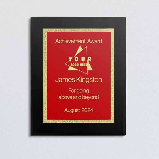 Custom Stainless Steel Plaque Award For Achievement With Black Board And Red Plate With Florentine Border On Office Wall