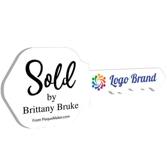 House Key Shaped White Acrylic Sign Color Printed With Sold By Message And Sample Logo And Name Against White Background