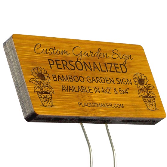 A bamboo garden sign with rounded corners on a metal stake set on a white background, featuring sample engraved text and a placeholder artwork.