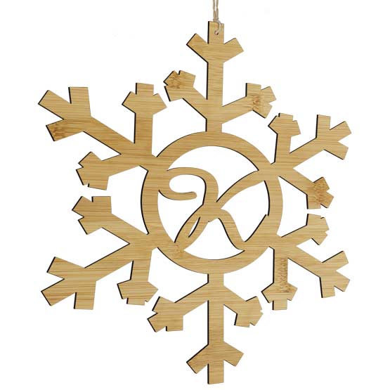 Custom Snowflake Cutout Bamboo Sign With Monogram Cutout Hanging Via Holes And Twine Against White Background