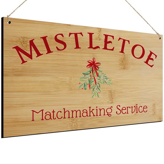 Custom Full Color Bamboo Sign Printed With Mistletoe Matchmaking Service Text And Mistletoe Artwork Against White Background