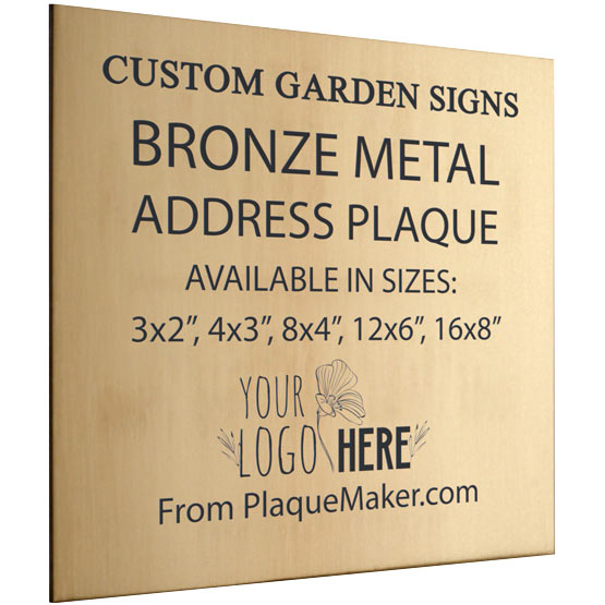 A custom bronze metal address sign with black engraved text on the front with a placeholder artwork. Set at a slight angle on a white background.