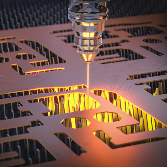 Laser cutting machine cutting through solid copper metal.