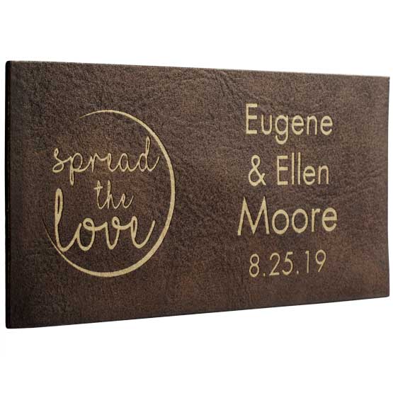 Custom Rustic And Gold Faux Leather Label Engraved With Spread The Love Message And Couple Names And Date