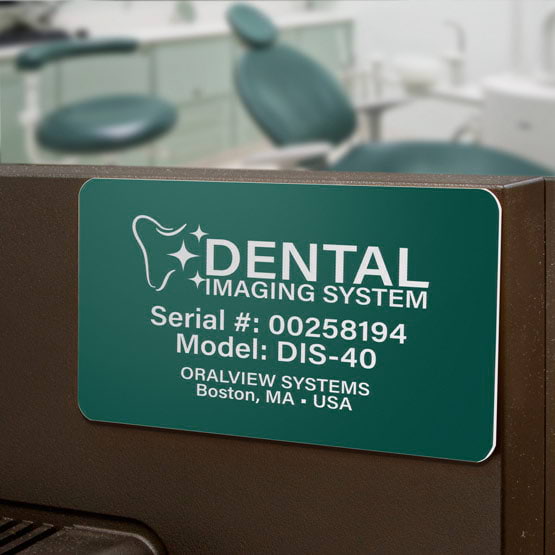 Custom Green Plastic Tag Engraved With Logo And Serial Number And Model Number And Address Mounted On Brown Panel
