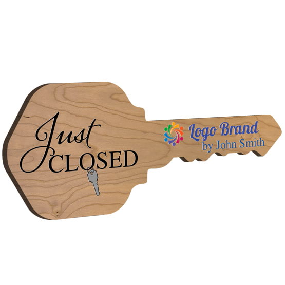 House Key Shaped Cherry Wood Sign Color Printed With Just Closed Message And Sample Name And Logo Against White Background