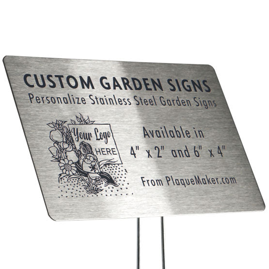 A stainless steel garden sign set on a white background, featuring customizable engraved text and placeholder artwork, mounted on garden stake.