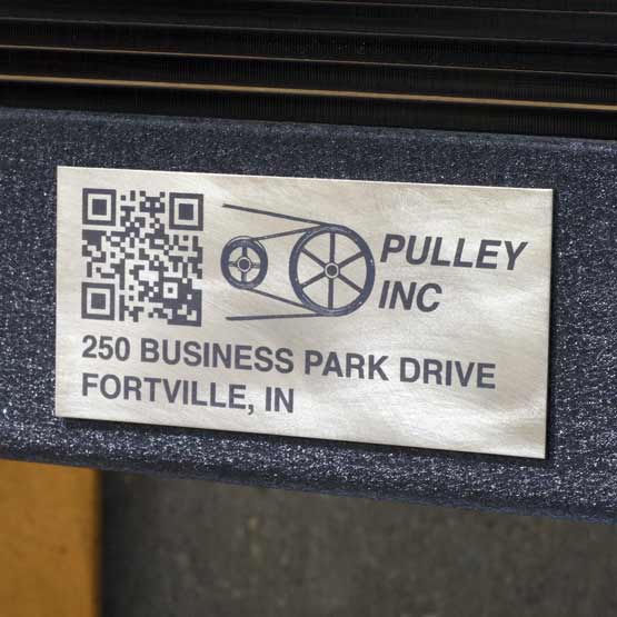 Custom Titanium Asset Tag Laser Fused With QR Code And Pulley Inc Logo And Address Mounted On Side Panel Of Equipment