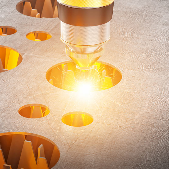 Laser cutting machine cutting through durable titanium metal sheet.