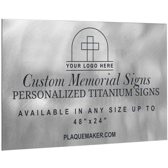 A custom titanium metal sign with personalized engraved text and placeholder artwork, set at slight angle and displayed on a white background.