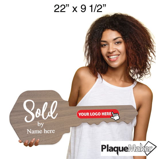 Size Guide With Woman Holding House Key Shaped Walnut Wood Sign Printed With Sold By Text And Showing Customizable Areas