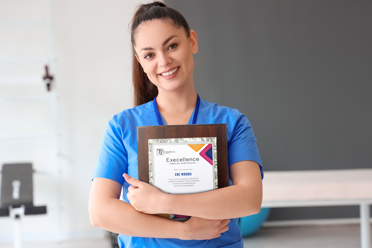 A medical professional holding a certificate kit from PlaqueMaker to display an achievement she was awarded.