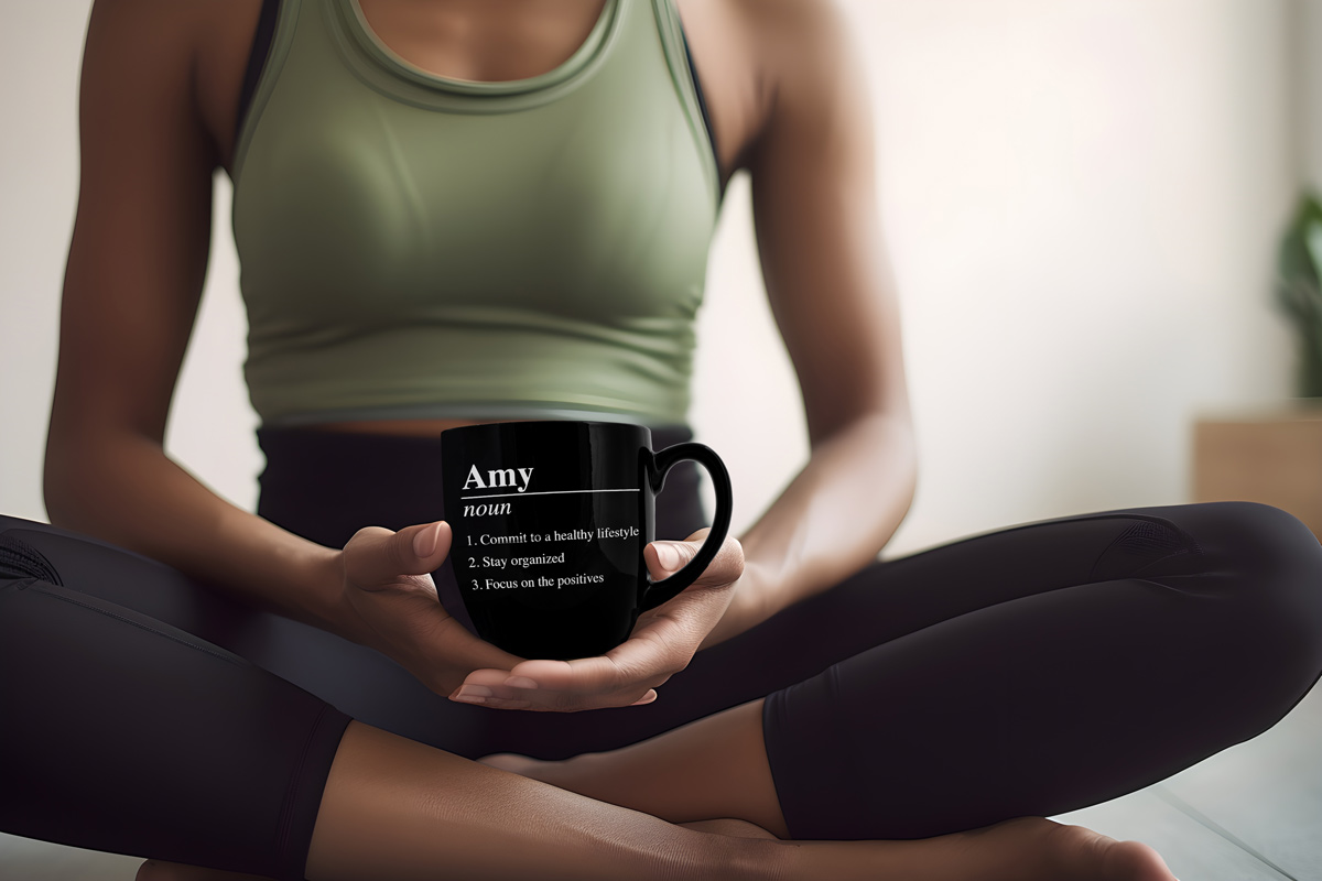 Personalized dictionary mug held by meditating woman