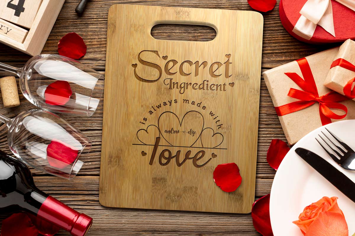 Custom 11 inch bamboo cutting with a personalized design engraved on the front for Valentine’s Day.